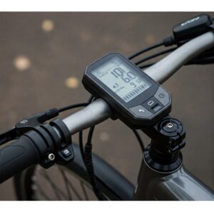 Close-up of the digital display and handlebar controls on a 20 inch e bike.