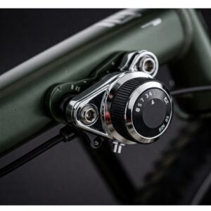 e bike suspension: Close-up of the adjustment knobs on an e-bike's suspension, highlighting the ability to fine-tune the ride characteristics.
