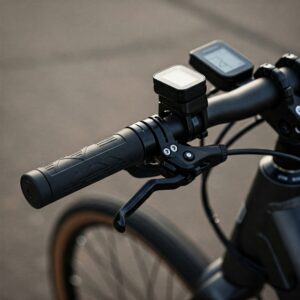 "E bike handlebar setup showing the e bike thumb throttle integrated with other controls."