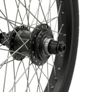 Detailed view of ebike wheel spokes and rim.