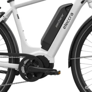 Detail of the integrated motor and long-lasting battery on a modern white electric bike.