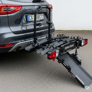 Rear view of a vehicle with an ebike rack with ramp securely attached to the hitch receiver, showcasing its robust design and the extended ramp ready for use to load ebikes.