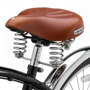 The cushioned saddle with springs on a Giant cruiser bike.