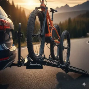 Wide tire cradles on the hitch mounted bike rack with ramp designed for fat tire mountain bikes.