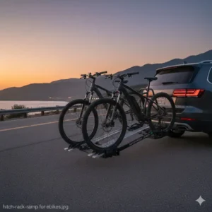 Heavy-duty hitch bike rack with ramp for suv securely holding two large electric mountain bikes.