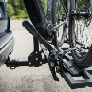 4: Detailed view of the wheel straps and frame clamp securing a bike on a hitch bike rack with ramp easy loading.