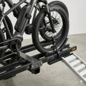 A heavy-duty hitch bike rack with ramp under $1000 carrying two fat tire e-bikes.